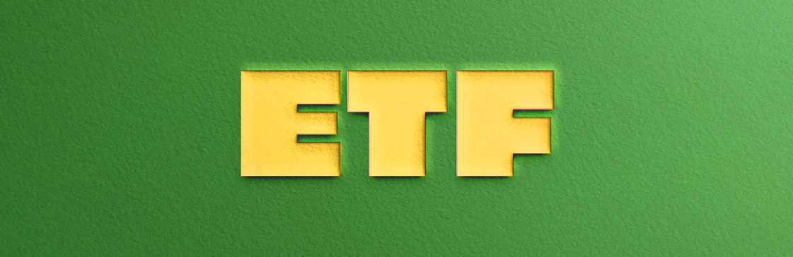 Image depicting ETF letters on a vibrant green background, symbolizing the exploration of the article about what ETFs to buy