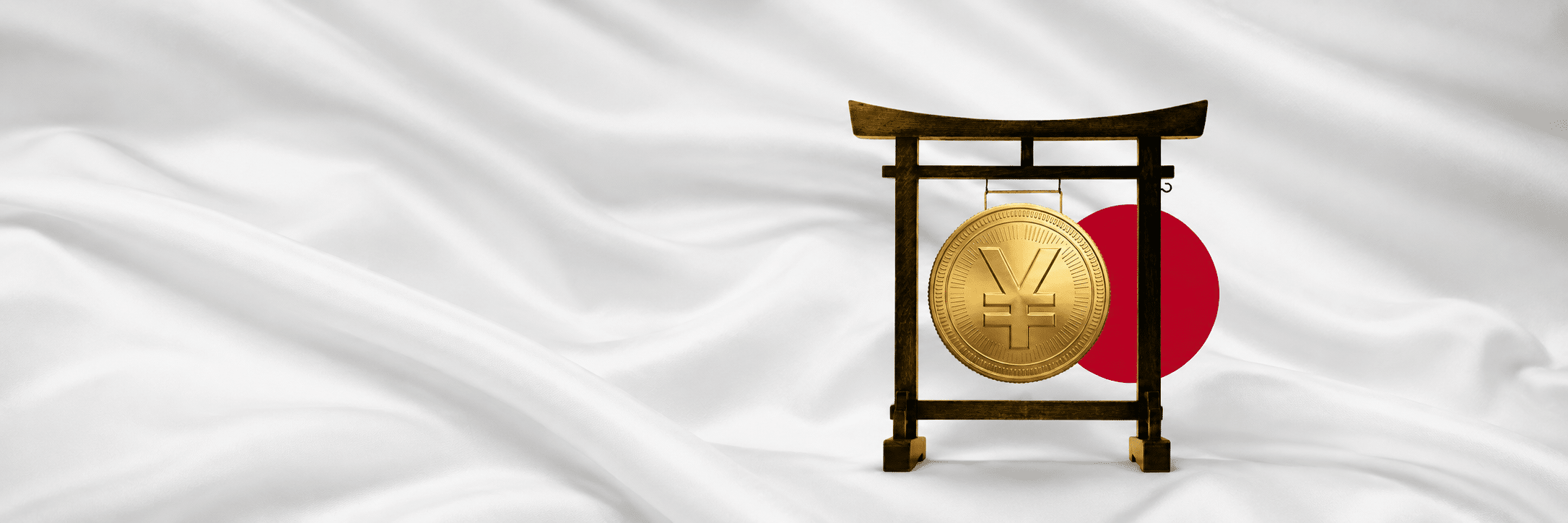 Japanese Yen outlook: gold yen coin in a torii gate against the Japan flag